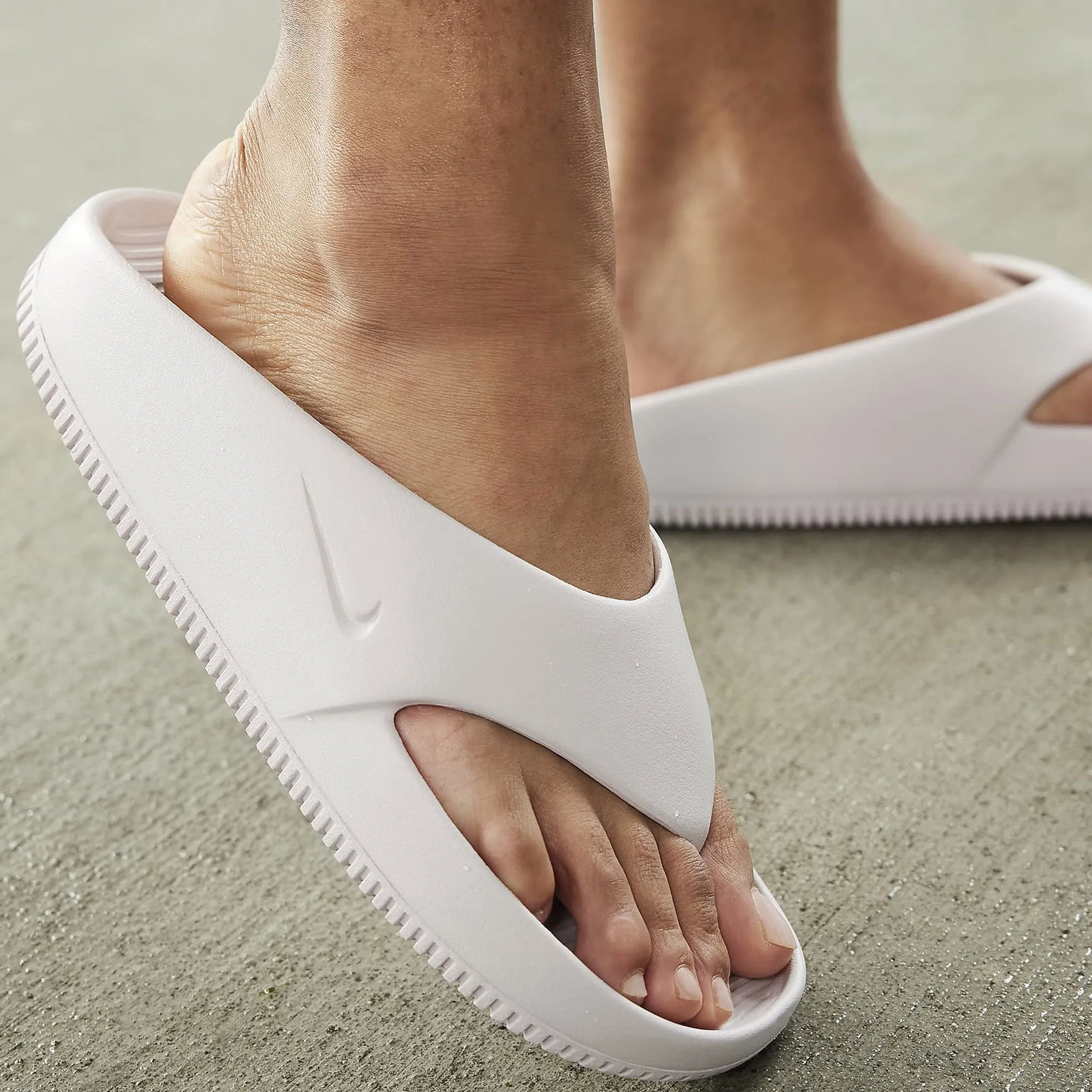 Nike | WMN'S CALM FLIP FLOPS  { PLATINUM VIOLET/PLATINUM VIOLET